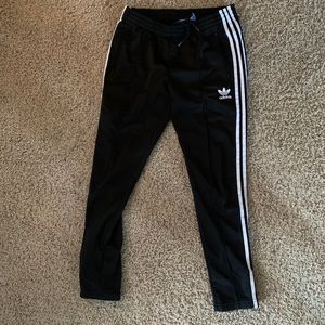 Adidas woman’s track joggers pants.